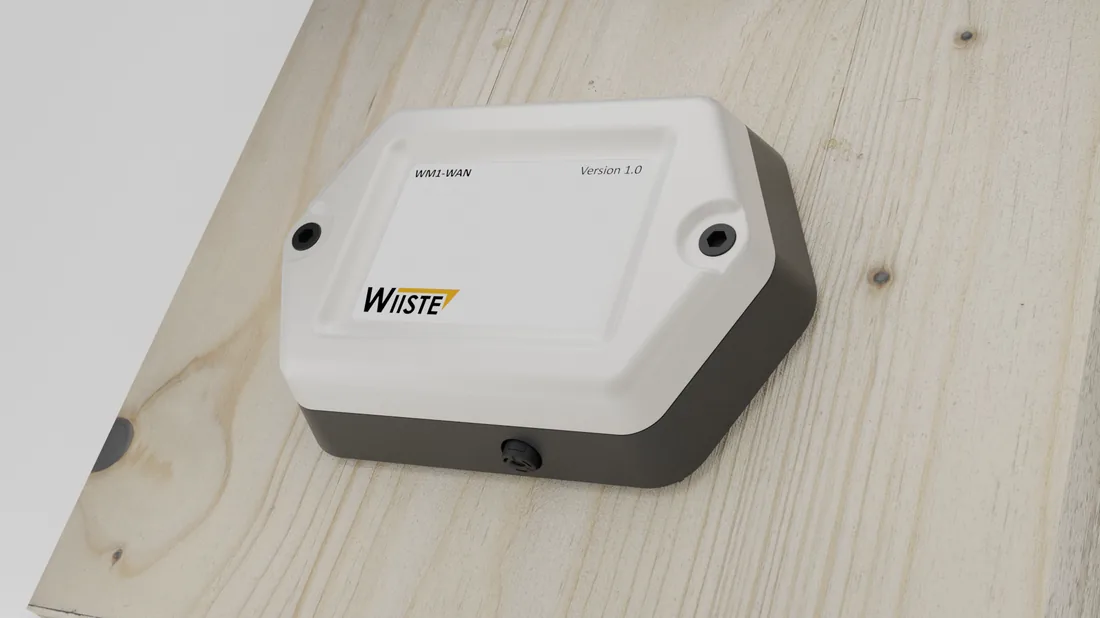 A Wiiste wood moisture sensor mounted on a timber surface
