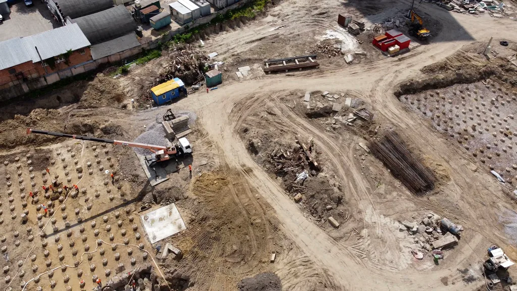 A drilling rig on a city site, borehole data being logged