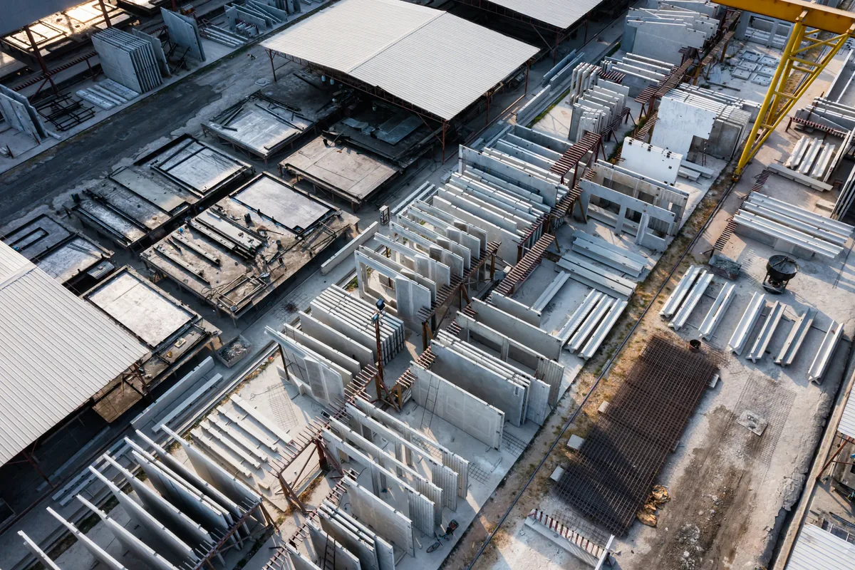 Aerial view of a precast yard with finished elements stacked for dispatch
